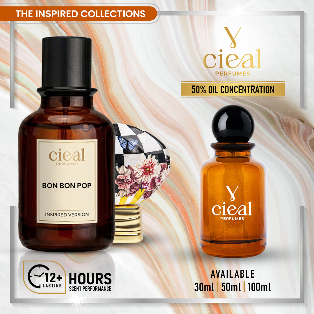 Cieal Perfumes Bon Bon Pop inspired version fragrance set, featuring an amber glass bottle with a black cap and a matching amber glass spray bottle, displayed on a decorative marbled background with promotional text.
